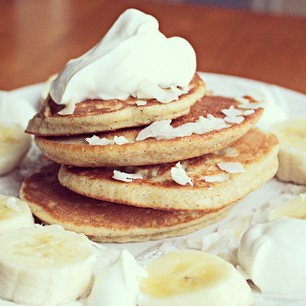 snickerdoodle almond flour pancakes topped with greek yogurt, coconut & banana. aka breakfast