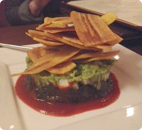 Guacamole Timbale – poblano-guacamole, chipotle black beans, jicama-cucumber salsa, plantain chips, ranchero sauce.
