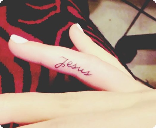 Jesus finger tattoo