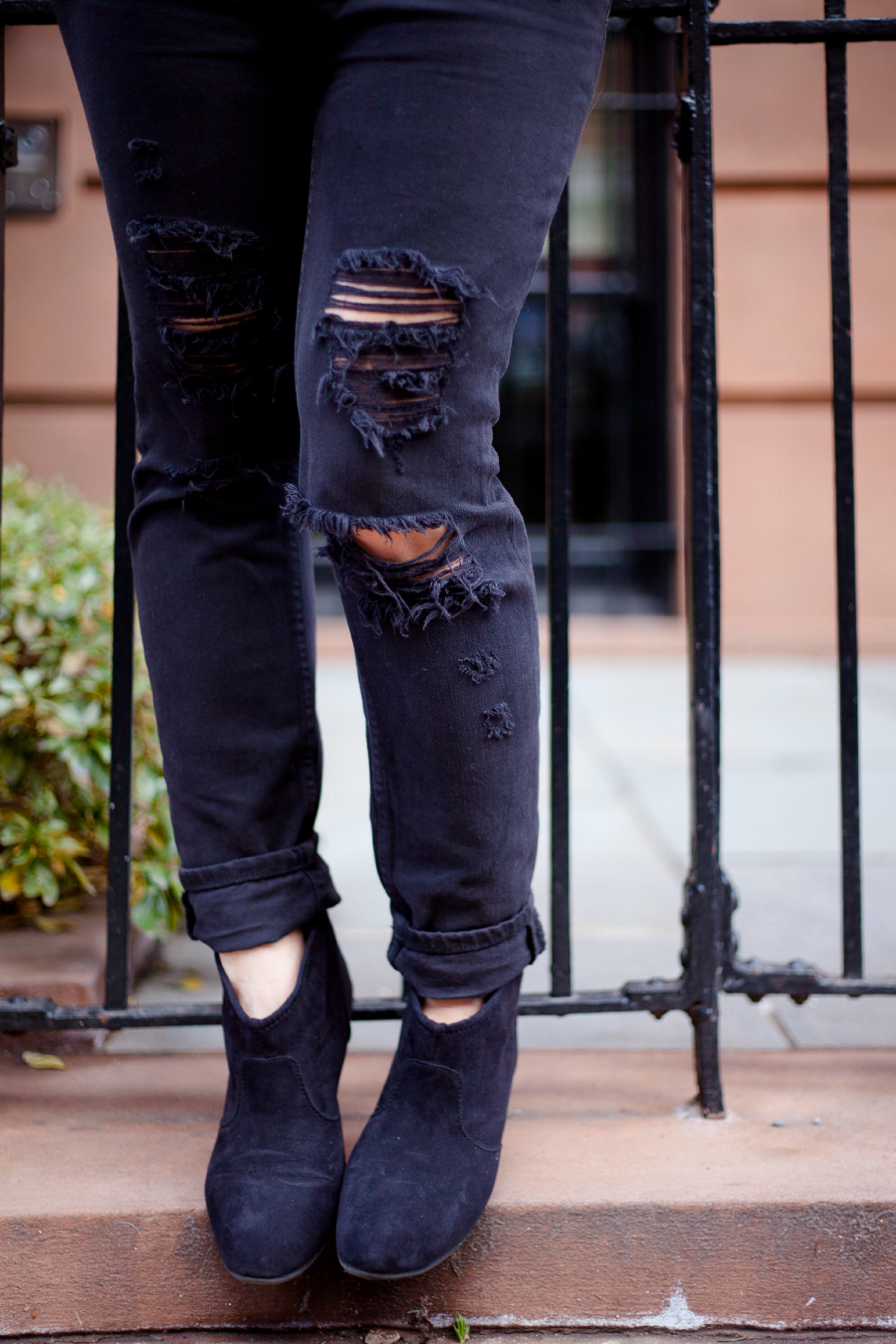 distressed black jeans
